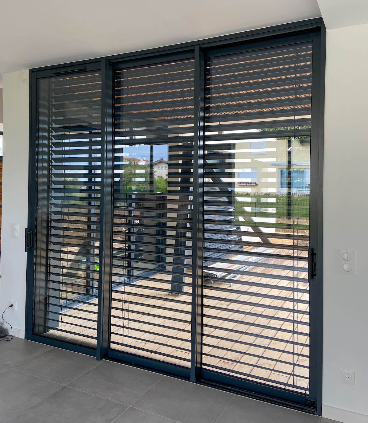 Réalisation Brise-soleil orientables et volets roulants