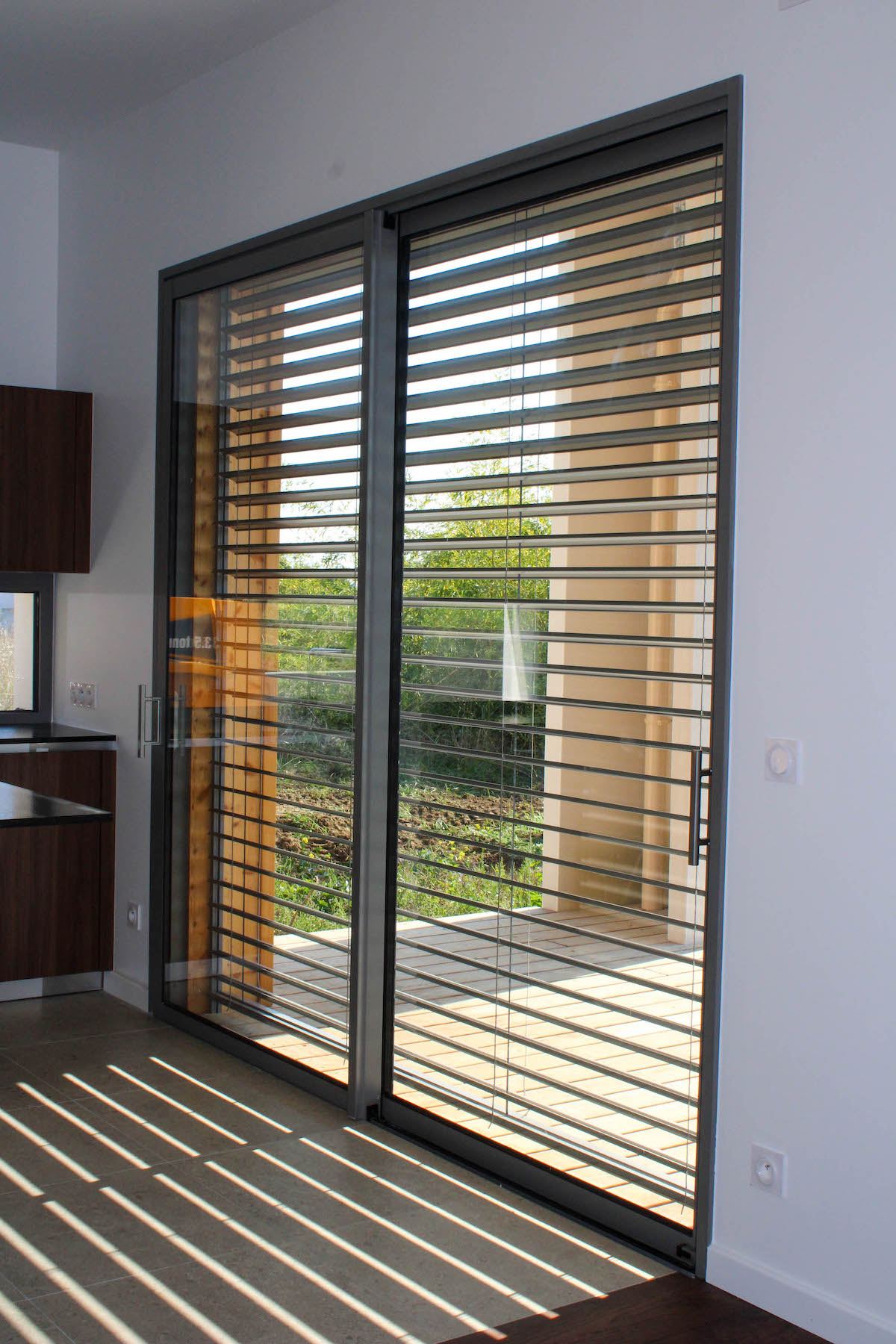 Réalisation Brise-soleil orientables et volets roulants